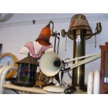 An assortment of lamps, including vintage anglepoi