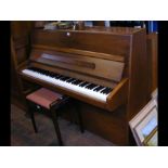 A modern Knight upright piano - width 138cms