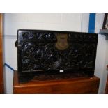 A Chinese carved black lacquered chest - width 81c