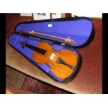 A Stradivarius copy violin, with bow and case
