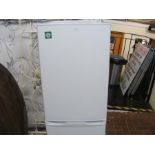 An unbranded white fridge/freezer