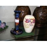 A Moorcroft Pottery 16.5cm high candlestick with '