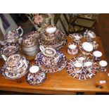 A large collection of Crown Derby Imari ware inclu