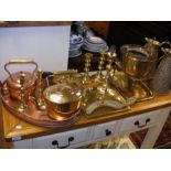 An assortment of brass and copper metal ware
