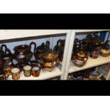 A quantity of bronzed lustre ware - across two she