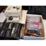 A box of costume jewellery together with the jewel