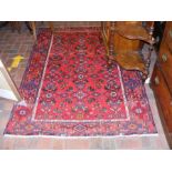 A Central Persian Hamedan red ground rug - 187cm x
