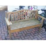 A wooden garden bench - length 125cm