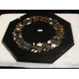 An Ashford black marble Pietra Dura octagonal table top, inlaid