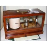 A sestrel barograph with chart drawer under
