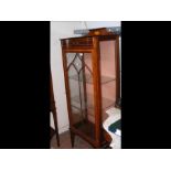 A reproduction inlaid mahogany display cabinet enc