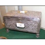 An embossed silver casket with foliate decoration