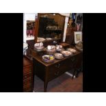 An Edwardian dressing table with mirror over