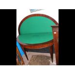 A half round fold-over games table
