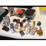 A box of collectable lighters, together with one o