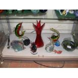 A selection of Murano glass fish etc.