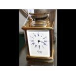 A Woodford reproduction brass cased carriage clock