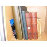 A postcard album together with vintage books inclu