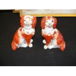 A pair of Small Staffordshire dog ornaments