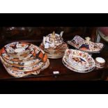 An antique two handled Imari serving tray, togethe