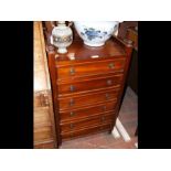 A six drawer mahogany narrow chest