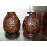 A pair of 20cm high bronze Oriental vases with sig