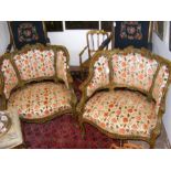 A pair of decorative French antique armchairs with