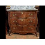 An antique Bombe marble top commode - having three