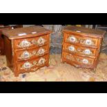 A pair of miniature three drawer chests - 23cms hi