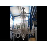 An antique crystal multi-branch chandelier - 120cm
