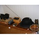 A Battersby bowler hat, vintage dog, wine coaster