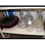 Assorted glass decanters, together with three retr