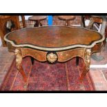 A 19th century red Boulle centre table with shaped