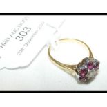 A ruby and diamond ring in 18ct mount