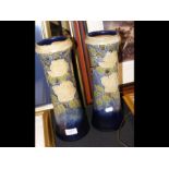 A pair of Royal Doulton vases with imprint to base