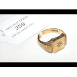 A gent's 9ct gold signet ring with diamond mount