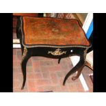 A Victorian red Boulle side table with ormolu moun