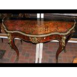 A 19th century red Boulle and ebonized side table