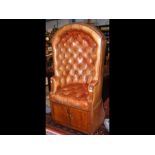 A Victorian leather Porters chair with button back