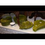 A collection of Italian green leaf platters