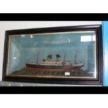 An old ship's diorama of three masted twin funnele