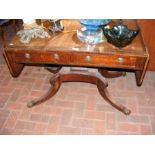 A 19th century sofa table with two drawers to the