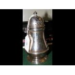 A silver sugar castor with London hallmark - 15cm