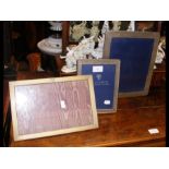 Three silver photo frames