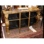 An antique French Empire style open bookcase with