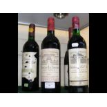 Five vintage bottles of red wine, including Chatea