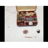 A selection of jewellery including brooches, earri