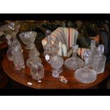 A selection of old cut glass decanters, most with
