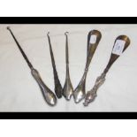 Silver handled button hooks, shoe horn