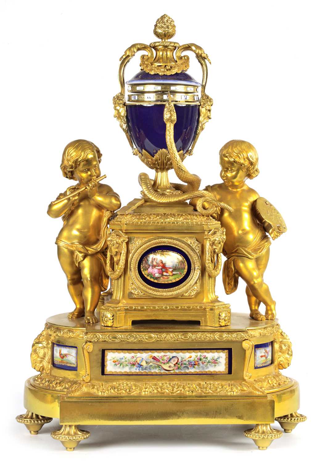 A FINE MID 19TH FRENCH ORMOLU AND 'SEVRES' PORCELAIN MOUNTED REVOLVING URN CLOCK
